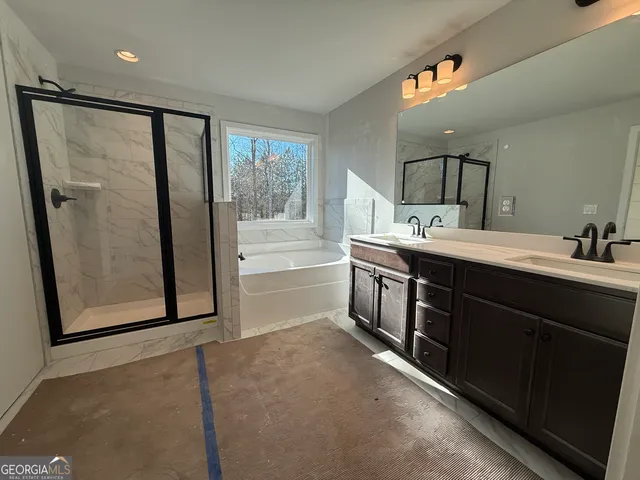 a room with a sink and cabinets