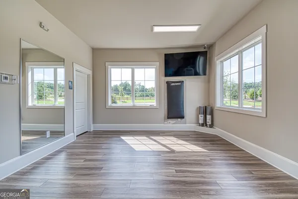 a view of a room with gym equipment