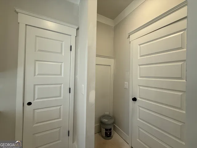 a bathroom with a toilet and a sink