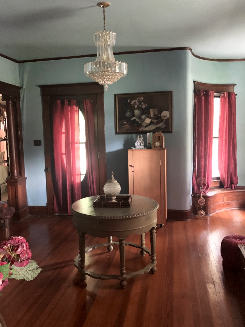403 East 3rd Street Brocton, IL 61917 - Photo 11 of 39 a view of a dining room with furniture and chandelier
