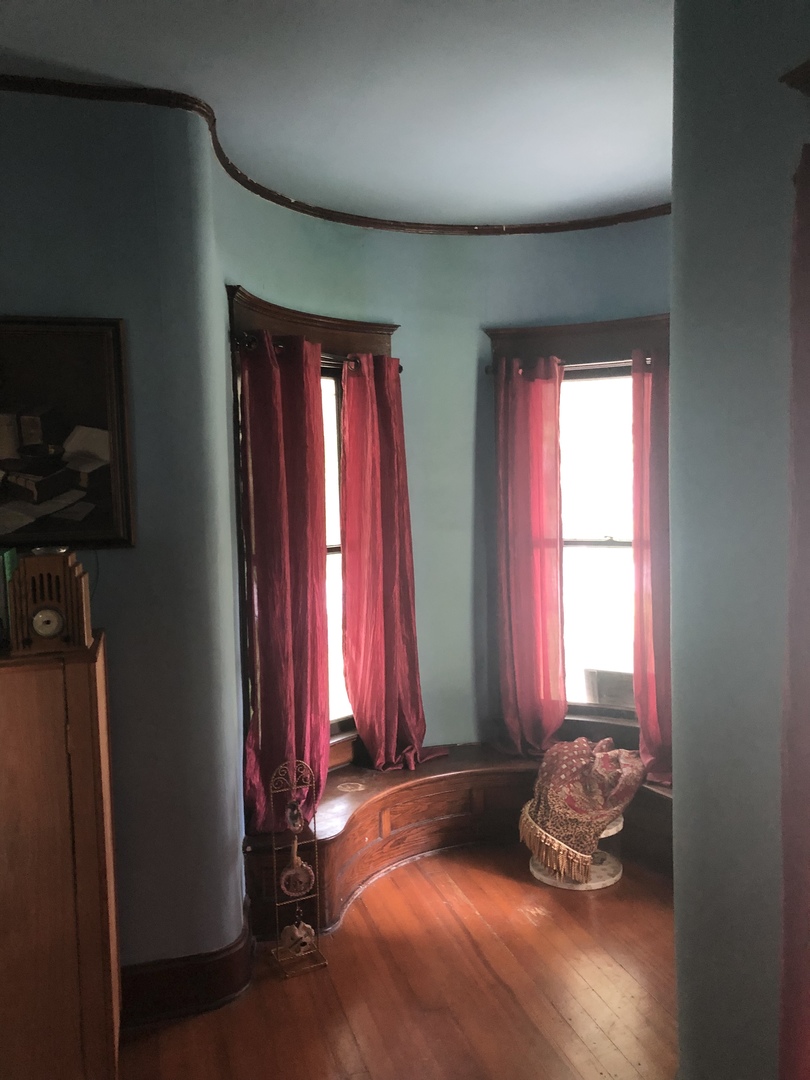 403 East 3rd Street Brocton, IL 61917 - Photo 12 of 39 a room with two beds and a window