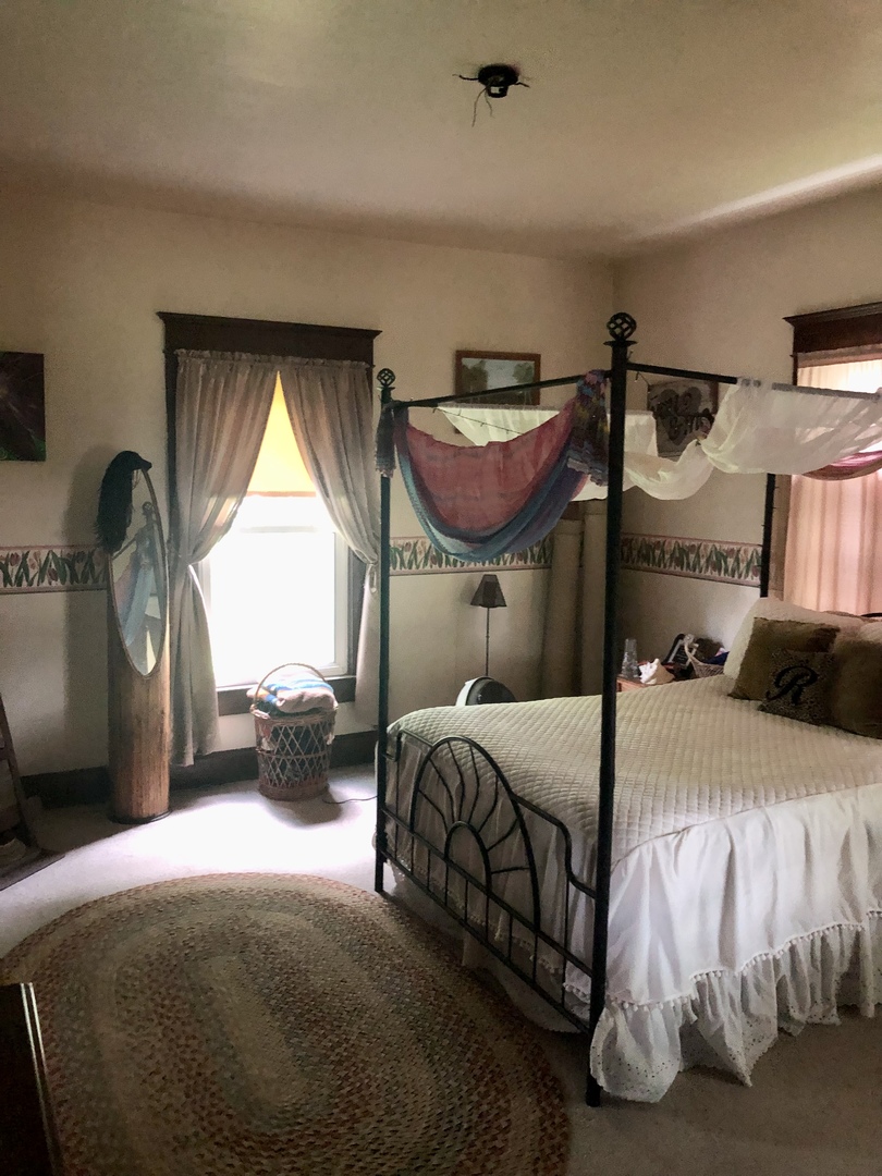 403 East 3rd Street Brocton, IL 61917 - Photo 14 of 39 a bedroom with a bed and window