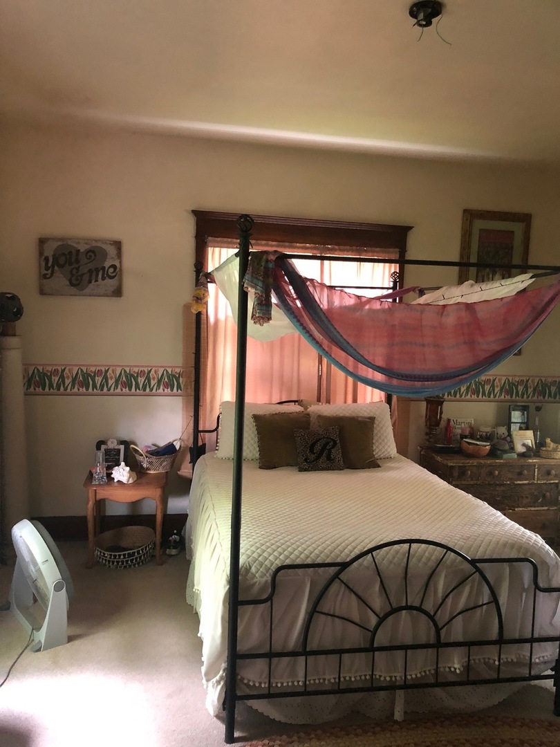 403 East 3rd Street Brocton, IL 61917 - Photo 15 of 39 a bedroom with a bed and window