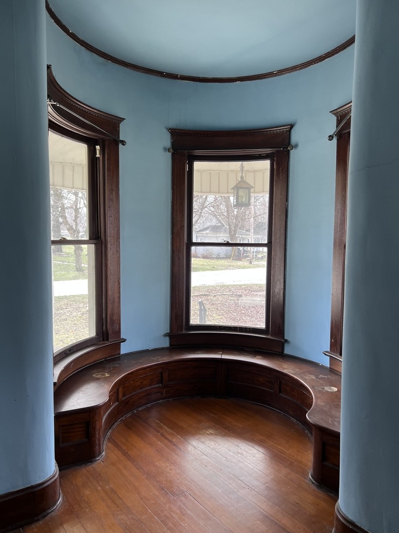 403 East 3rd Street Brocton, IL 61917 - Photo 6 of 39 a view of a room with wooden floor and a window