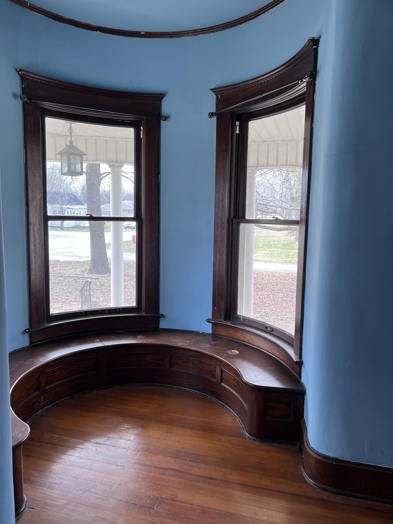 403 East 3rd Street Brocton, IL 61917 - Photo 7 of 39 a view of a room with wooden floor and windows