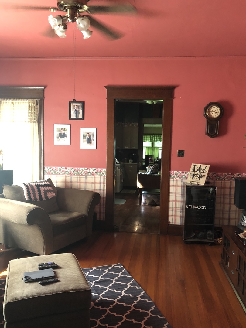 403 East 3rd Street Brocton, IL 61917 - Photo 9 of 39 a living room with furniture and a fireplace