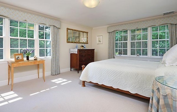 75 Sargent Road Brookline, MA 02445 - Photo 11 of 19 a spacious bedroom with a bed and a window