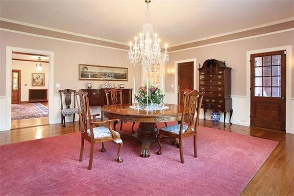 75 Sargent Road Brookline, MA 02445 - Photo 3 of 19 a view of a dining room with furniture and chandelier