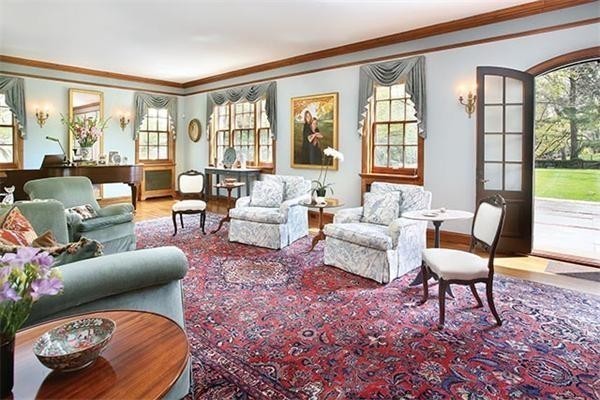 75 Sargent Road Brookline, MA 02445 - Photo 5 of 19 a living room with furniture and a large window
