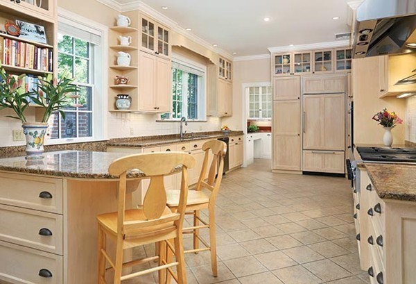 75 Sargent Road Brookline, MA 02445 - Photo 6 of 19 a kitchen with stainless steel appliances granite countertop a sink and a refrigerator