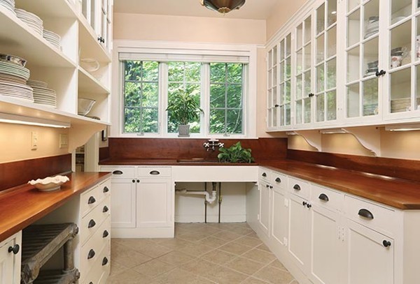 75 Sargent Road Brookline, MA 02445 - Photo 7 of 19 a kitchen with granite countertop a sink and a stove