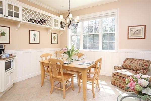 75 Sargent Road Brookline, MA 02445 - Photo 8 of 19 a dining room with furniture a livingroom and chandelier