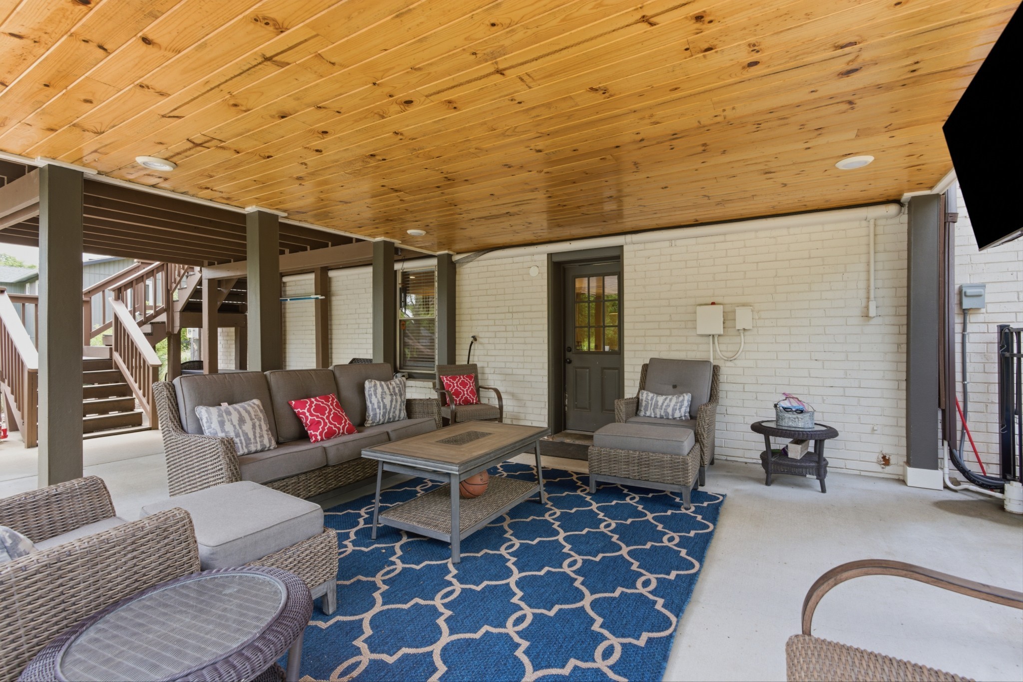 7939 Hooten Hows Road Nashville, TN 37221 - Photo 49 of 66 a living room with furniture and a flat screen tv
