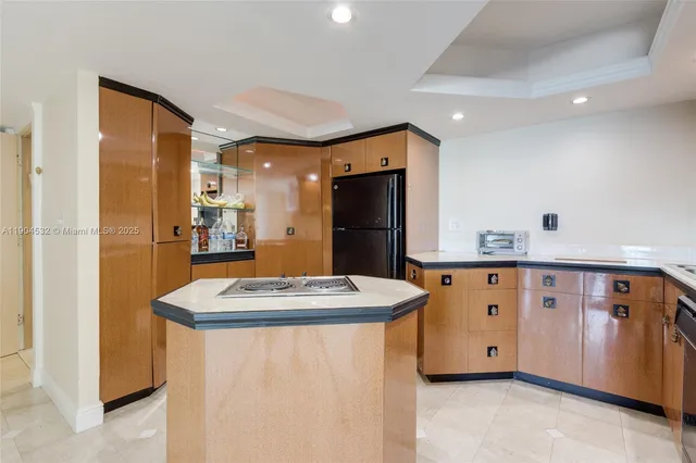 a kitchen with stainless steel appliances granite countertop a stove and a sink
