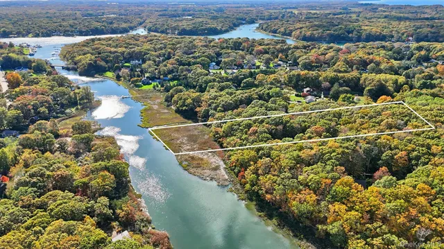 a view of a swimming pool with a outdoor seating