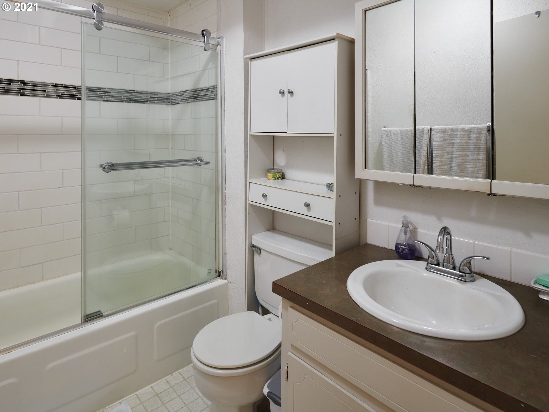 851 Southwest Broadway Drive, Unit 51 Portland, OR 97201 - Photo 11 of 19 a bathroom with a sink toilet and shower