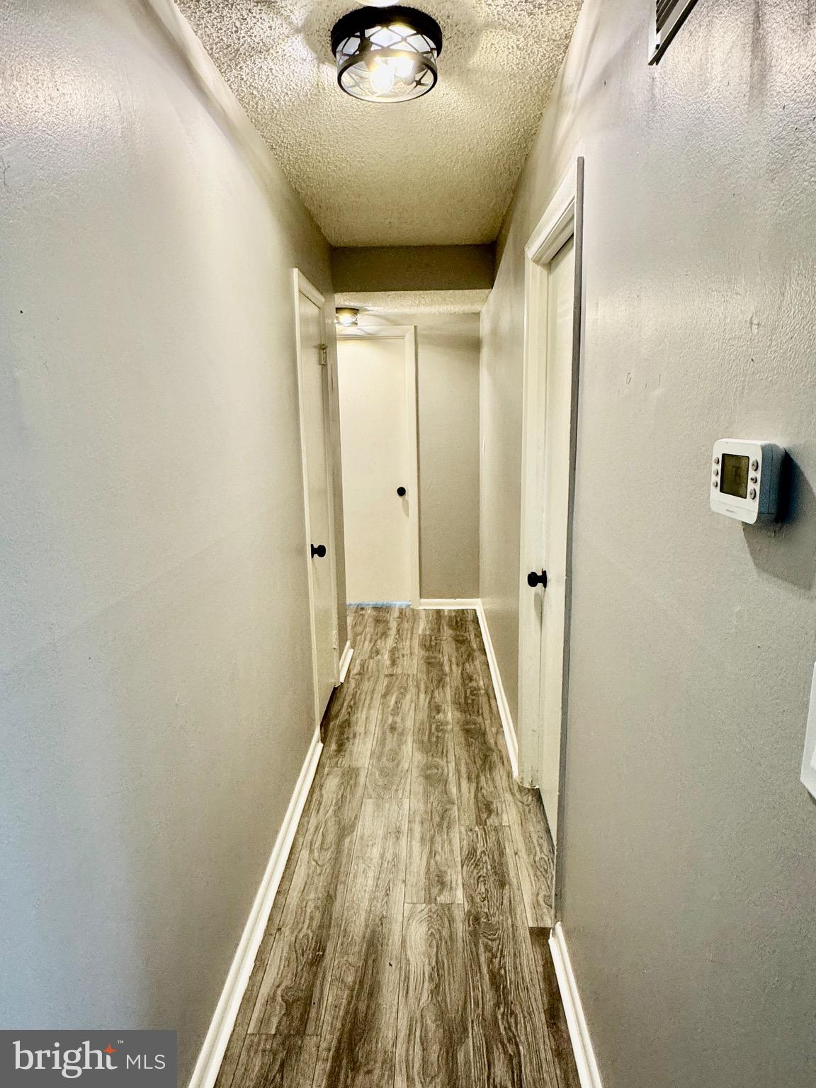 3811 Swann Road, Unit 102 Suitland, MD 20746 - Photo 5 of 10 a view of a hallway