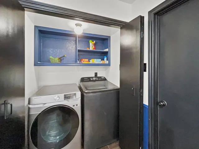 a view of a swimming pool with a yard