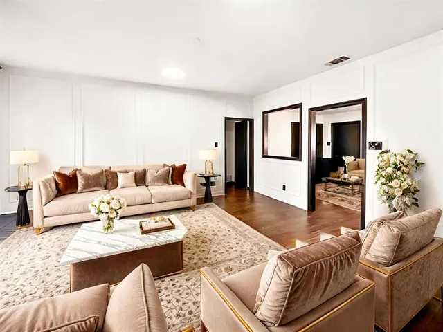 a living room with furniture and a couch