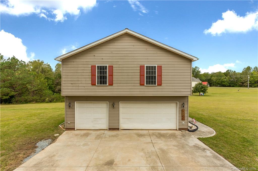 5520 Barrier Road Concord, NC 28025 - Photo 1 of 35 a front view of house with yard