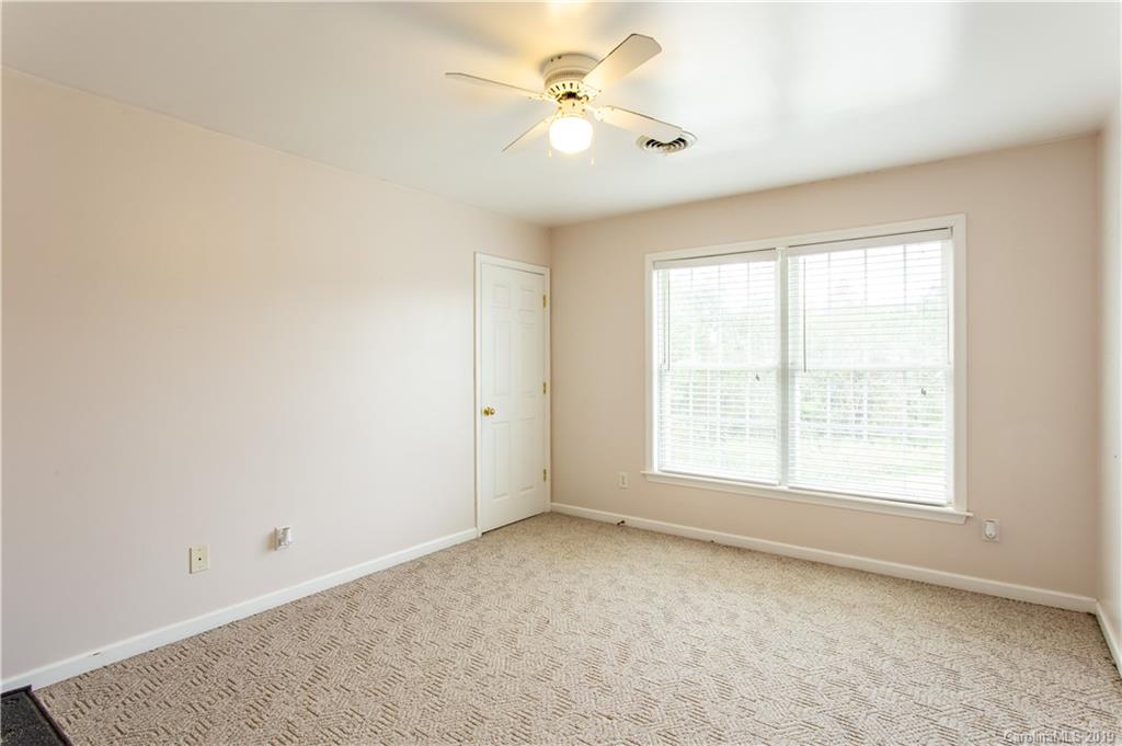 5520 Barrier Road Concord, NC 28025 - Photo 27 of 35 wooden floor in an empty room with a window
