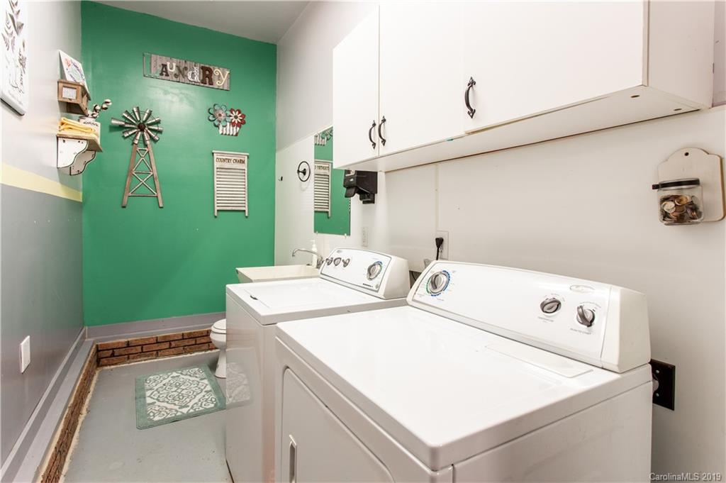 5520 Barrier Road Concord, NC 28025 - Photo 30 of 35 a utility room with dryer and washer