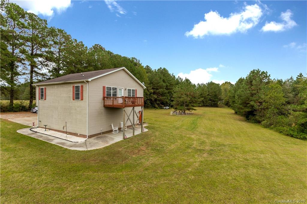 5520 Barrier Road Concord, NC 28025 - Photo 34 of 35 a view of a house with a yard