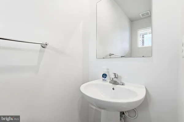 an empty room with wooden floor