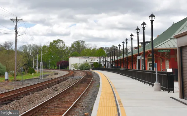 a view of a street with cars