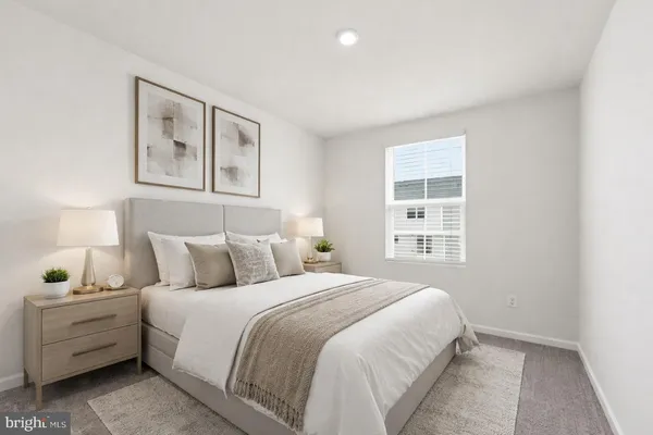 a backyard of a house with oven and potted plants