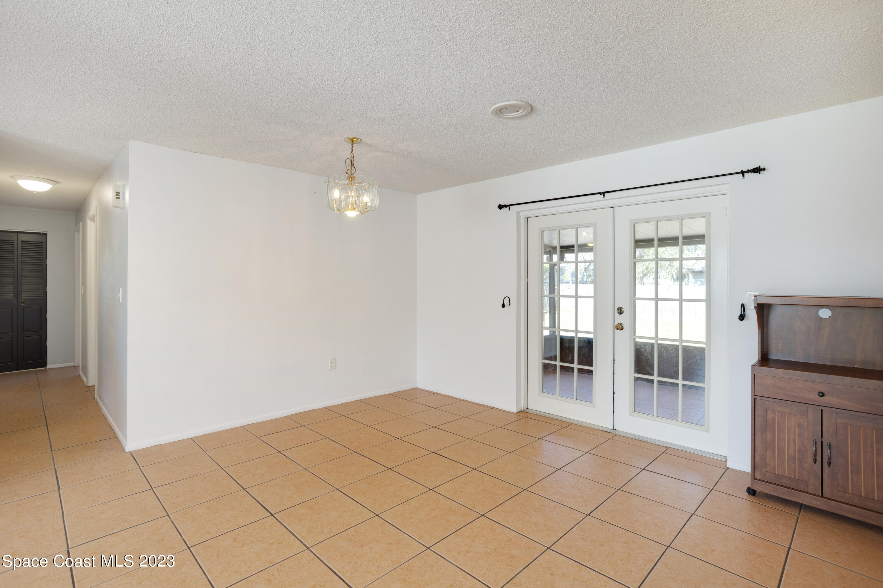 4240 Canela Road Cocoa, FL 32927 - Photo 13 of 30 French doors to back porch