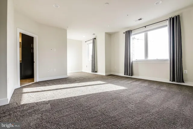 a view of a room with an empty space