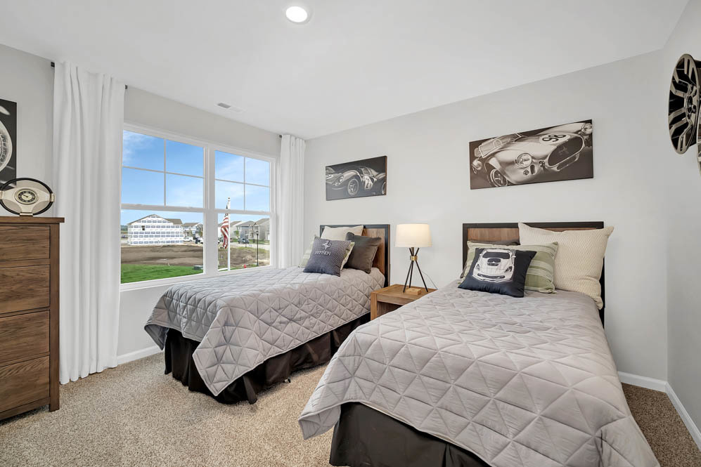 402 Arbor Ridge Court Hampshire, IL 60140 - Photo 13 of 47 a bedroom with two beds and a large window
