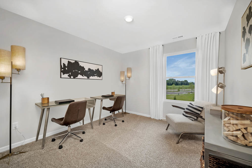 402 Arbor Ridge Court Hampshire, IL 60140 - Photo 15 of 47 a view of a workspace with furniture and a window