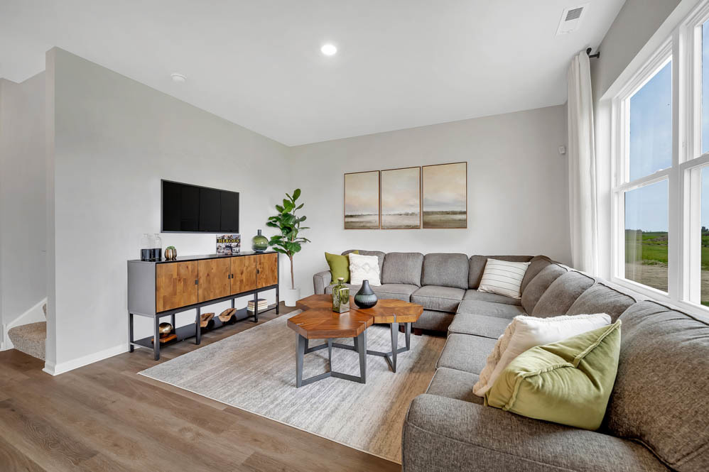 402 Arbor Ridge Court Hampshire, IL 60140 - Photo 5 of 47 a living room with furniture flat screen tv and a window