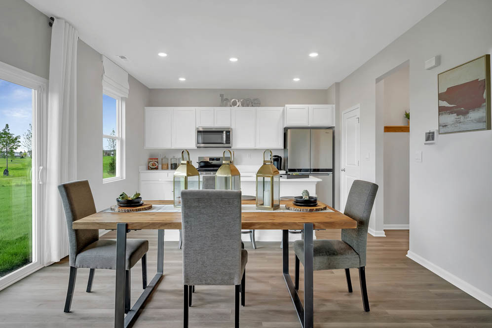 402 Arbor Ridge Court Hampshire, IL 60140 - Photo 6 of 47 a dining room with furniture and window