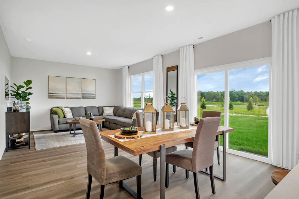 402 Arbor Ridge Court Hampshire, IL 60140 - Photo 9 of 47 a dining room with furniture window and wooden floor