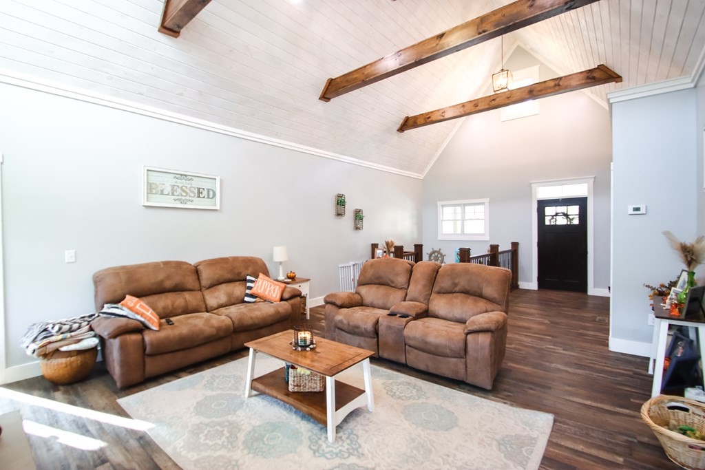 608 Lakeview Road Walling, TN 38587 - Photo 12 of 68 a living room with furniture and a wooden floor