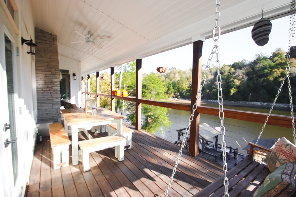 608 Lakeview Road Walling, TN 38587 - Photo 23 of 68 a living room with furniture and a floor to ceiling window
