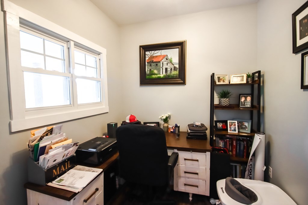 608 Lakeview Road Walling, TN 38587 - Photo 32 of 68 a living room with furniture and book shelf