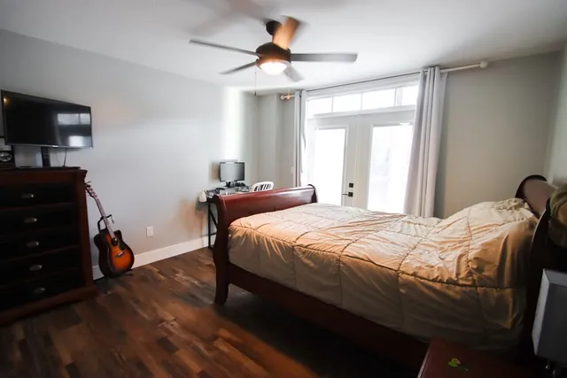 a balcony with furniture and wooden floor