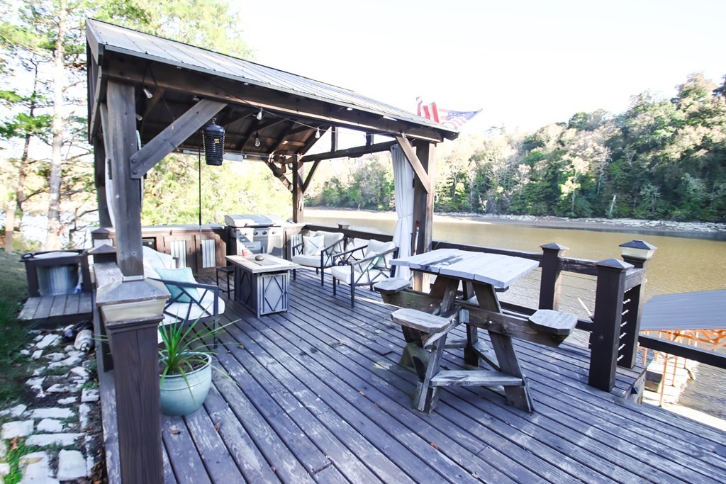 608 Lakeview Road Walling, TN 38587 - Photo 49 of 68 a view of deck with table and chairs