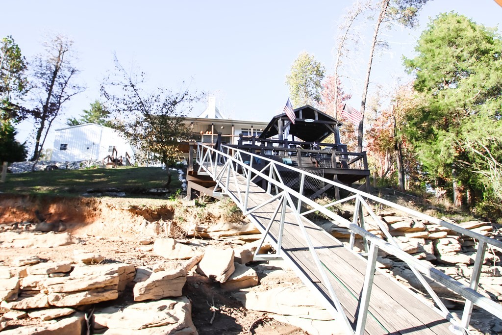 608 Lakeview Road Walling, TN 38587 - Photo 60 of 68 a view of a balcony with wooden floor and lake view