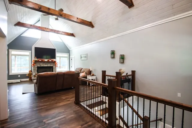 a kitchen with a center island and stainless steel appliances
