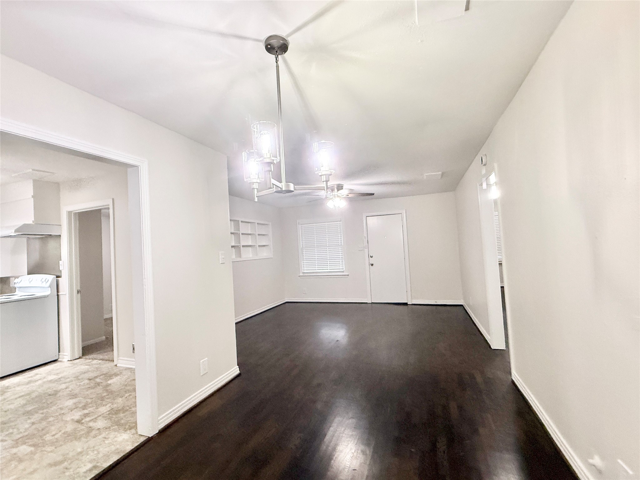 832 South Anderson Street Angleton, TX 77515 - Photo 7 of 19 a view of empty room with wooden floor