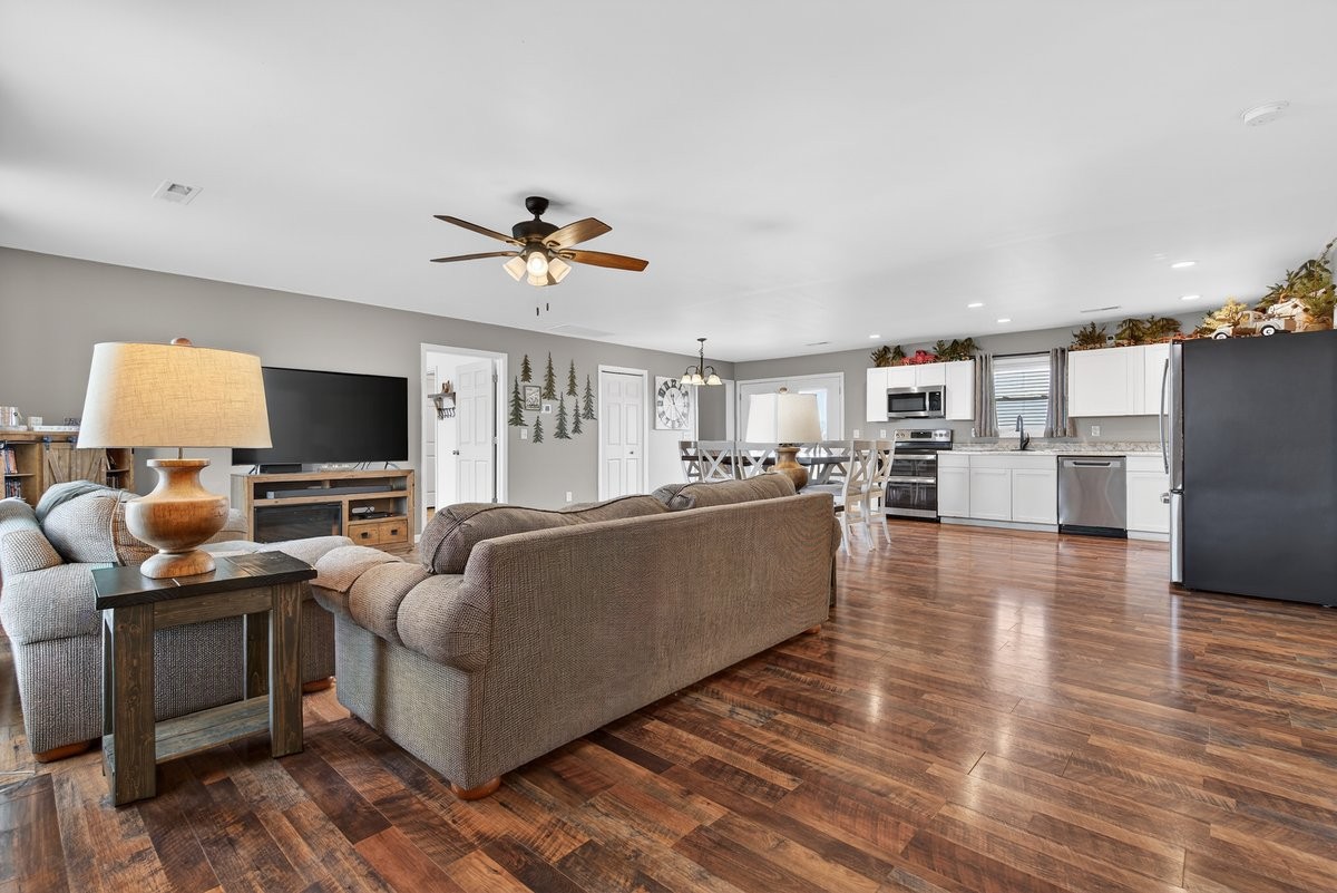 15419 Old Palestine Road Crofton, KY 42217 - Photo 12 of 53 a living room with furniture and a flat screen tv