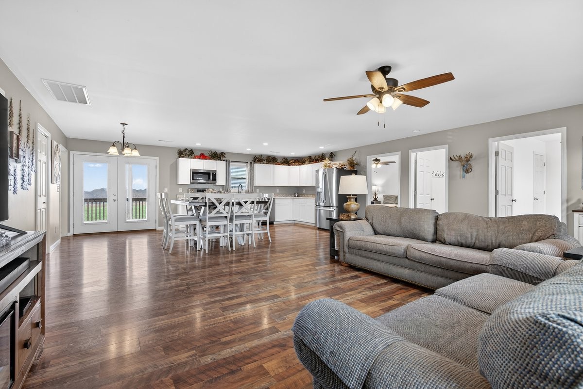 15419 Old Palestine Road Crofton, KY 42217 - Photo 14 of 53 a living room with furniture and a view of kitchen