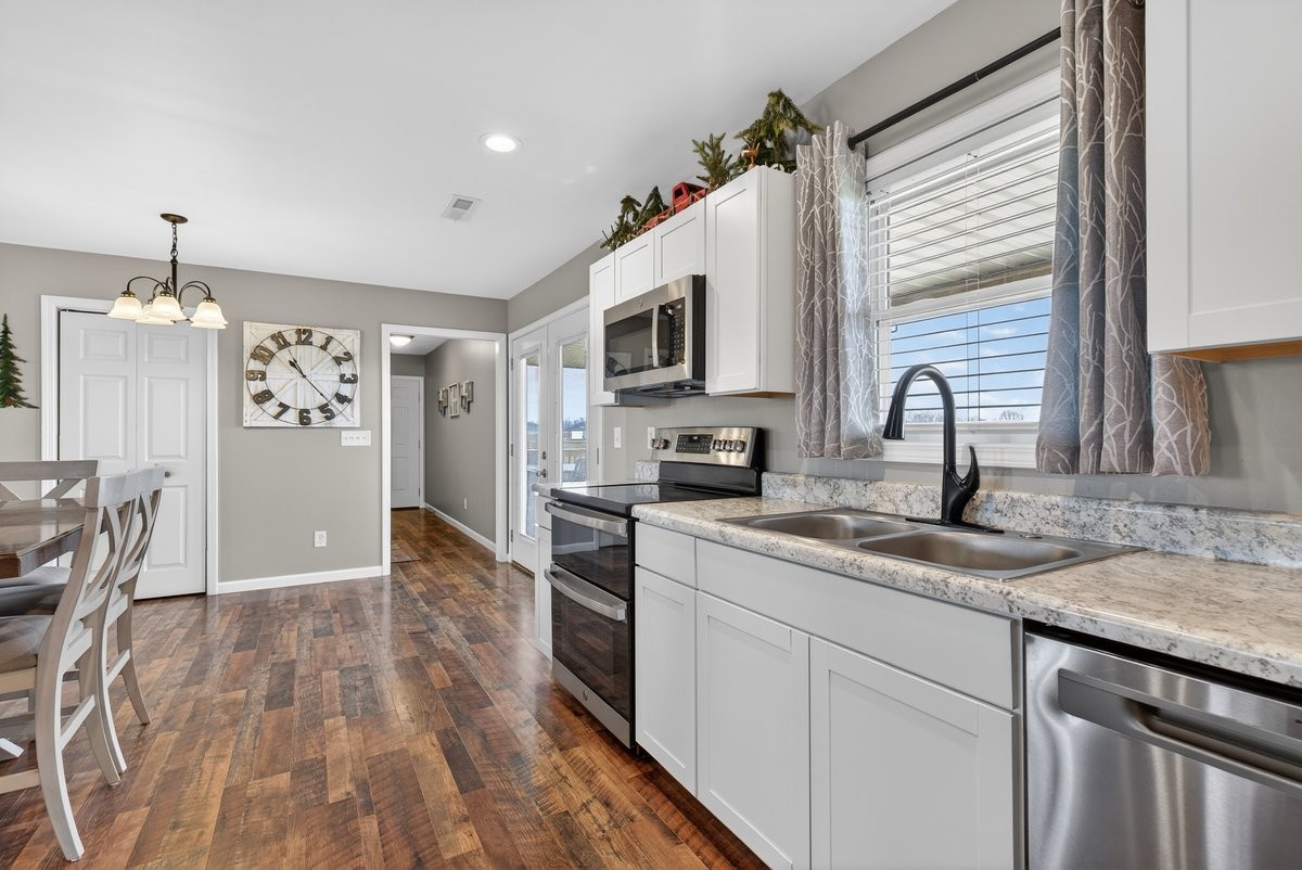 15419 Old Palestine Road Crofton, KY 42217 - Photo 17 of 53 a kitchen with a sink appliances and cabinets