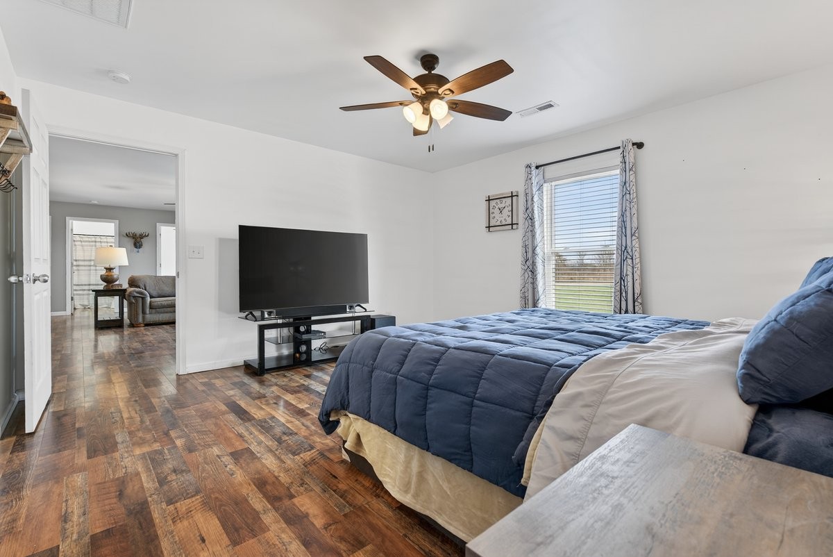 15419 Old Palestine Road Crofton, KY 42217 - Photo 29 of 53 a bedroom with a bed and a flat screen tv