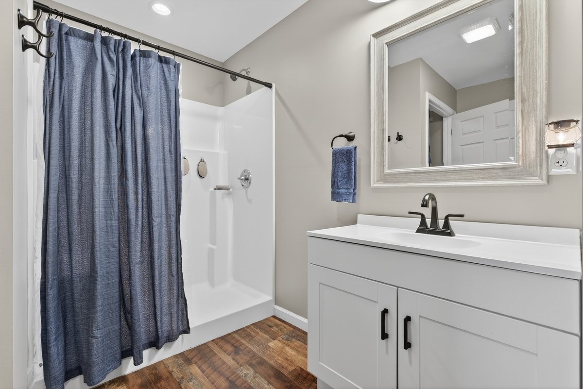 15419 Old Palestine Road Crofton, KY 42217 - Photo 31 of 53 a bathroom with a sink and a mirror